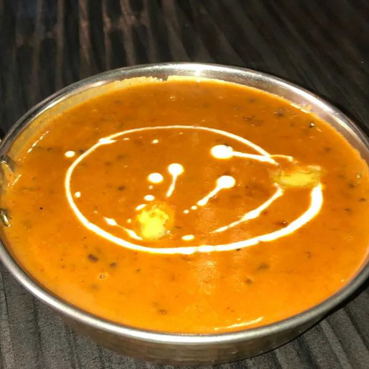 Dal makhani with a swirl of cream