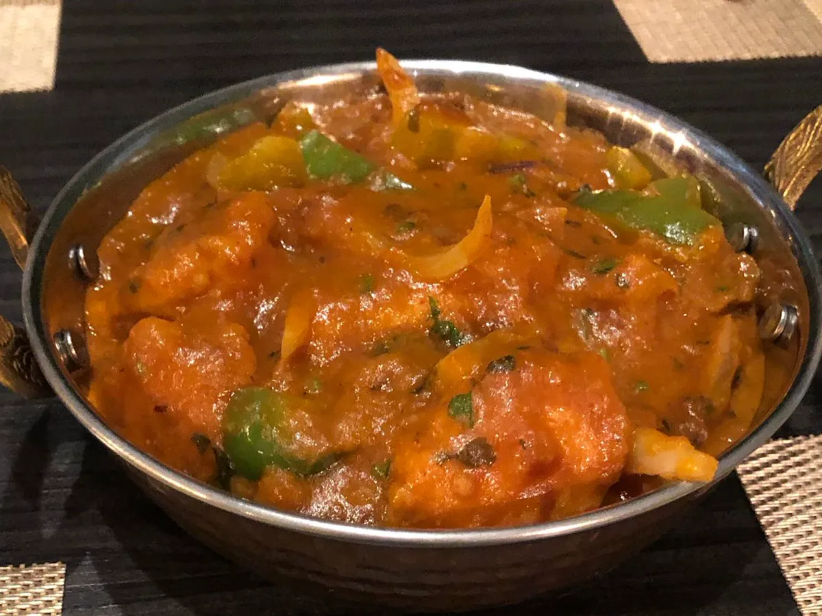 Curry with bell pepper and onion in a karahi